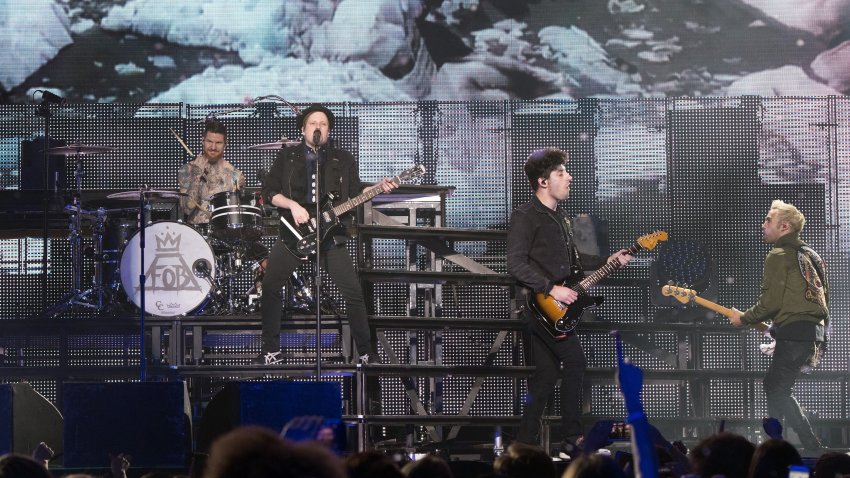 CHICAGO, ILLINOIS – MARCH 12:  Andy Hurley, Patrick Stump, Joe Trohman and Pete Wentz of Fall Out Boy perform during the Wintour Is Coming Tour at United Center on March 12, 2016 in Chicago, Illinois.  (Photo by Daniel Boczarski/Getty Images)