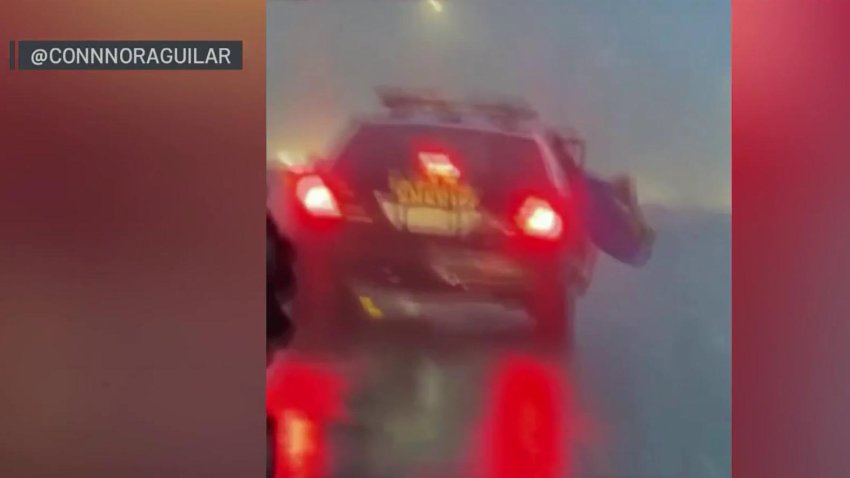 Shocking video recorded in Santa Clarita shows an inmate trying to escape a patrol car by leaping headfirst onto the 5 Freeway.