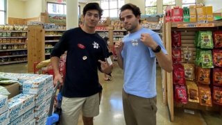 Christian Beltran (left) has been working at Trader Joe’s since 2021.