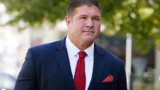 Jesse Benton arrives for his sentencing hearing at the federal courthouse in Des Moines, Iowa.