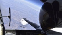 U.S. Air Force pilot looks down at the suspected Chinese surveillance balloon as it hovered over the Central Continental, United States February 3, 2023. 