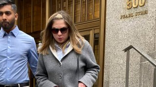 Isabella Pollok, right, leaves court following her sentencing, Feb. 22, 2023, in New York.
