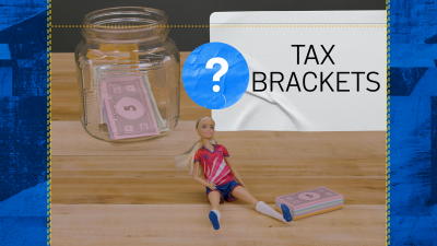 Tax brackets explained with Monopoly money, Barbie dolls and jars
