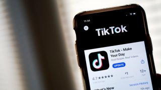 A leader of the U.S. Federal Communications Commission said he has asked Apple and Google to remove TikTok from their app stores over data security concerns. Pictured here is the TikTok download page on an Apple iPhone on August 7, 2020.