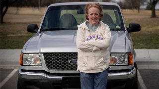 Carol Rice stands with her recently-purchased 2003 Ford Ranger