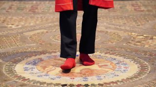 Abbey Marshal Howard Berry walks across the centre of the Cosmati pavement, located before the altar, during a photo call at Westminster Abbey