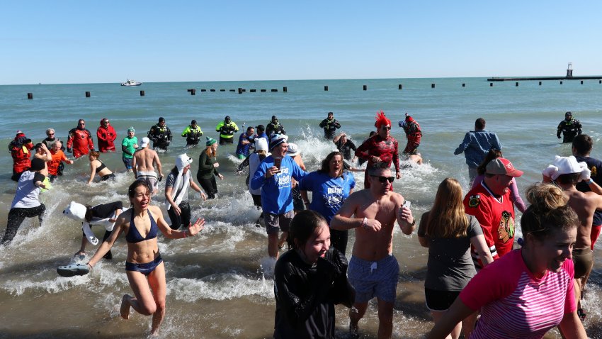 CHICAGO, USA – MARCH 04: People take part in the 18th Annual Chicago Polar Plunge organized to support the athletes of Special Olympics at North Ave Beach of Michigan Lake in Chicago, United States on March 04, 2018. (Photo by Bilgin S. Sasmaz/Anadolu Agency/Getty Images)