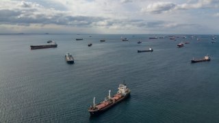 An aerial view shows ships at the anchorage area of the Bosphorus southern entrance in Istanbul, on October 12, 2022.