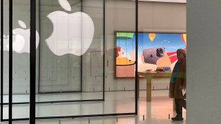 A person walks out of the Apple Store in Annapolis, Maryland, on February 2, 2023.