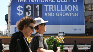 A billboard showing the debt limit is seen in Washington, DC on April 17, 2023.