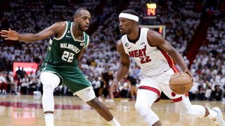 MIAMI, FLORIDA – APRIL 24: Jimmy Butler #22 of the Miami Heat drives against Khris Middleton #22 of the Milwaukee Bucks during the first quarter in Game Four of the Eastern Conference First Round Playoffs at Kaseya Center on April 24, 2023 in Miami, Florida. NOTE TO USER: User expressly acknowledges and agrees that, by downloading and or using this photograph, User is consenting to the terms and conditions of the Getty Images License Agreement. (Photo by Megan Briggs/Getty Images)