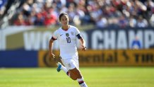 CHICAGO, ILLINOIS - OCTOBER 06:  Carli Lloyd #10 of the U.S. Women's National Team controls the ball during the World Cup Victory Tour game against South Korea at Soldier Field on October 06, 2019 in Chicago, Illinois. (Photo by Stacy Revere/Getty Images)