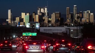 FILE - Traffic moves along the 110 Freeway in Los Angeles on Nov. 22, 2022.