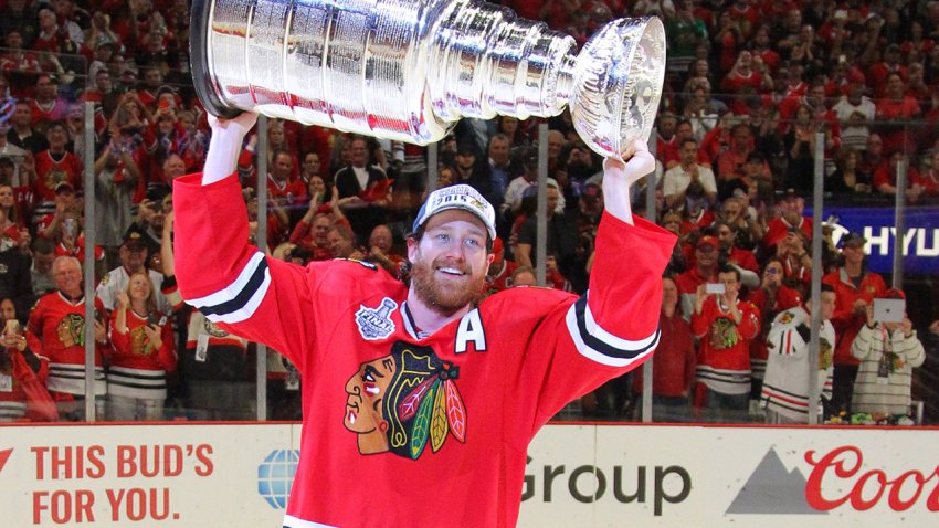 Jun 15, 2015; Chicago, IL, USA; Chicago Blackhawks defenseman Duncan Keith (2) hoists the Stanley Cup after defeating the Tampa Bay Lightning in game six of the 2015 Stanley Cup Final at United Center. Mandatory Credit: Dennis Wierzbicki-USA TODAY Sports