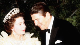 Her Majesty Queen Elizabeth II and President Ronald Reagan share a joke during a banquet in March 1983 in San Francisco, California.