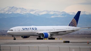 FILE - A United Airlines jetliner taxis to a runway for take off from Denver International Airport, Dec. 27, 2022.
