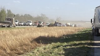 Illinois State Police respond to a massive pile-up caused by a dust storm in Illinois that left six people dead and three dozen more injured.