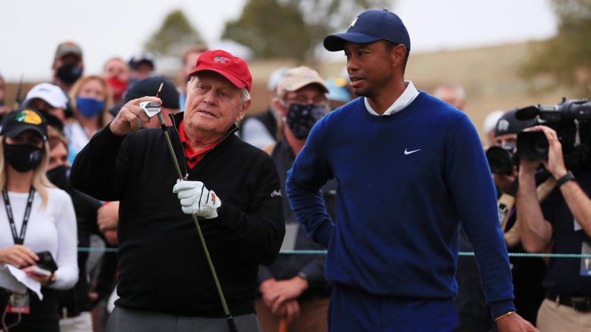 Jack Nicklaus talks to Tiger Woods of the United States on the 19th tee during the Payne’s Valley Cup on Sept. 22, 2020 on the Payne’s Valley course at Big Cedar Lodge in Ridgedale, Mo.