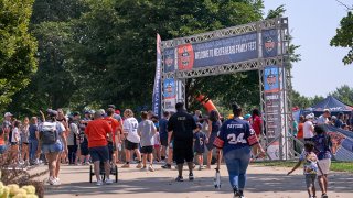 LAKE FOREST, IL – AUGUST 03: Chicago Bears fans attend the Chicago Bears training camp on Family Fest Day at Soldier Field on August 3, 2021 at Soldier Field in Chicago, IL. (Photo by Robin Alam/Icon Sportswire via Getty Images)