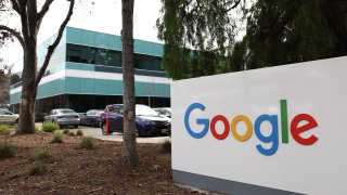 A sign is posted in front of an office at Google headquarters on February 02, 2023 in Mountain View, California. Google parent company Alphabet reported lower-than-expected fourth quarter revenue with net income $13.62 billion, or $1.05 per share, compared to $20.64 billion, or $1.53 per share, one year ago.