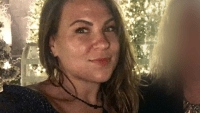 Man charged after missing woman found dead in Logan Square home