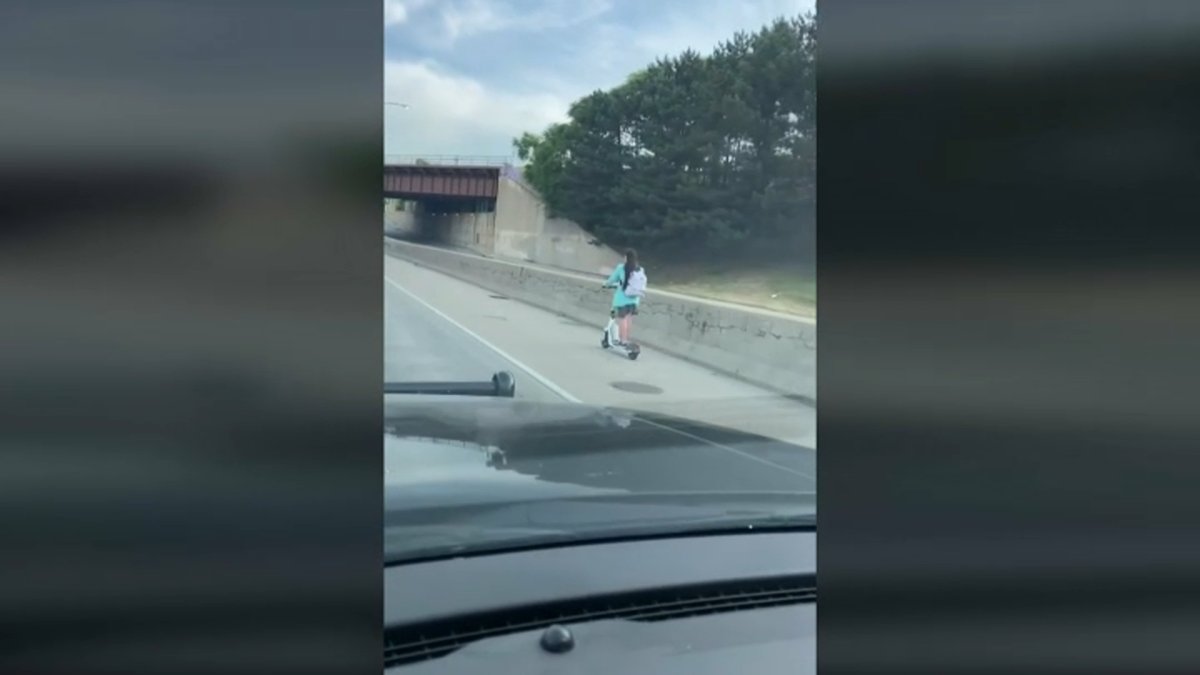 Video captures woman riding escooter during rush hour on Chicago