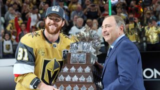 NHL commissioner Gary Bettman presents Jonathan Marchessault #81 of the Vegas Golden Knights with the Conn Smythe trophy after the Vegas Golden Knights defeated the Florida Panthers in Game Five of the 2023 NHL Stanley Cup Final at T-Mobile Arena on June 13, 2023 in Las Vegas, Nevada.