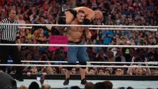 Dwayne ”The Rock” Johnson and John Cena in action during WrestleMania XXVIII at Sun Life Stadium on April 1, 2012 in Miami Gardens, Florida.