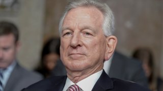 FILE – Sen. Tommy Tuberville, R-Ala., listens during the Senate Armed Services Committee hearing on July 12, 2023, on Capitol Hill in Washington.