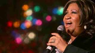 FILE - In this Dec. 4, 2008 file photo, Aretha Franklin performs during the 85th annual Christmas tree lighting at the New York Stock Exchange in New York.