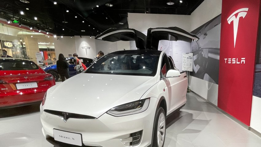 BEIJING, CHINA – FEBRUARY 13: A Model X is on display at a Tesla showroom on February 13, 2021 in Beijing, China. (Photo by VCG/VCG via Getty Images)