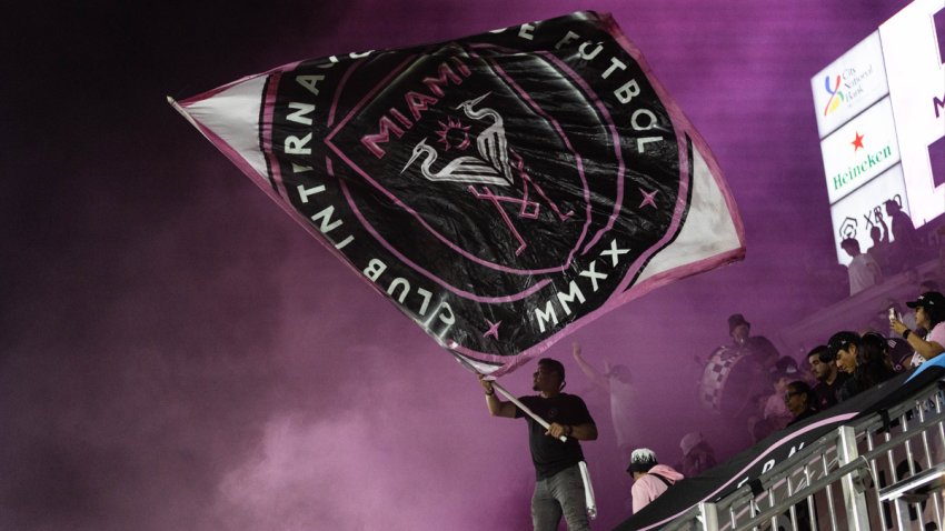 Fan waving Inter Miami flag during a game vs the New York Red Bulls at DRV PNK Stadium on May 31, 2023 in Fort Lauderdale, Florida.