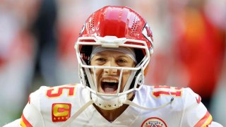 Patrick Mahomes #15 of the Kansas City Chiefs runs onto the field before playing against the Philadelphia Eagles in Super Bowl LVII at State Farm Stadium on February 12, 2023 in Glendale, Arizona.