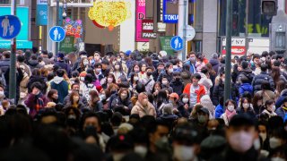 People shopping along the streets of Shinsaibashi in Osaka, Japan.