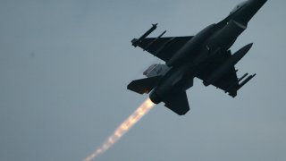 An F-16 rises from low altitude in Canada in this file photo.