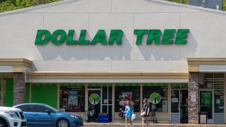Shoppers are seen at the parking lot of a Dollar Tree store in Bloomsburg, Pennsylvania.