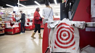 Plastic bags hang on a self-checkout kiosk at a Target store in Chicago.