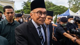 Malaysia’s then-opposition leader Anwar Ibrahim leaves after meeting with Malaysia’s King at the National Palace in Kuala Lumpur on November 22, 2022.