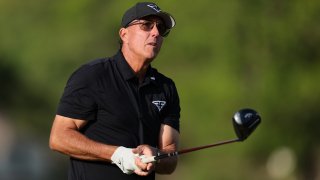 Phil Mickelson of the United States watches his shot from the ninth tee during the first round of the 2023 PGA Championship at Oak Hill Country Club on May 18, 2023 in Rochester, N.Y.