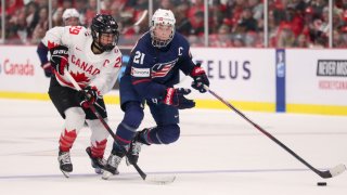 Forward Marie-Philip Poulin of Canada skates against forward Hilary Knight of USA during the gold medal game of the 2023 IIHF Women’s World Championship at CAA Centre on April 16, 2023 in Brampton, Ontario.