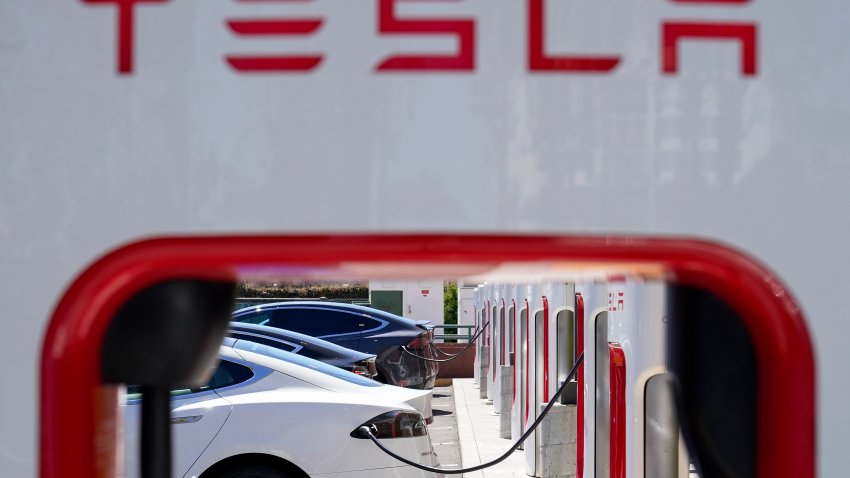 FILE – Tesla vehicles charge at a station in Emeryville, Calif., Aug. 10, 2022. In a document posted Tuesday, Aug. 1, 2023, U.S. auto safety regulators have opened another investigation into safety problems with Tesla vehicles concerning loss of steering control or loss of power steering in the 2023 Models 3 and Y electric vehicles.