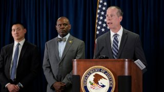 Robert Tripp, special agent in charge of the FBI’s San Francisco Field Office, right, speaks to reporters during a press conference to announce federal authorities have charged current and former Northern California police officers in a corruption investigation Thursday, Aug. 17, 2023, in San Francisco. Arrest warrants were served Thursday in California, Texas and Hawaii.