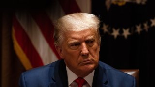 U.S. President Donald Trump listens during a meeting with members of the National Association of Police Organizations Leadership in the Cabinet Room of the White House July 31, 2020 in Washington, DC.