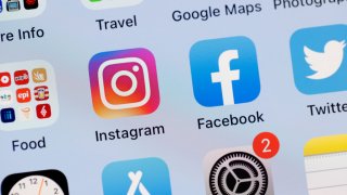 In this photo illustration, the Facebook and Instagram apps are seen on the screen of an iPhone on October 04, 2021 in San Anselmo, California.