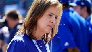 CHICAGO, ILLINOIS – SEPTEMBER 18:  Laura Ricketts, co-owner of the Chicago Cubs stands on the field prior to a game between the Chicago Cubs and the Colorado Rockies at Wrigley Field on September 18, 2022 in Chicago, Illinois. (Photo by Nuccio DiNuzzo/Getty Images)