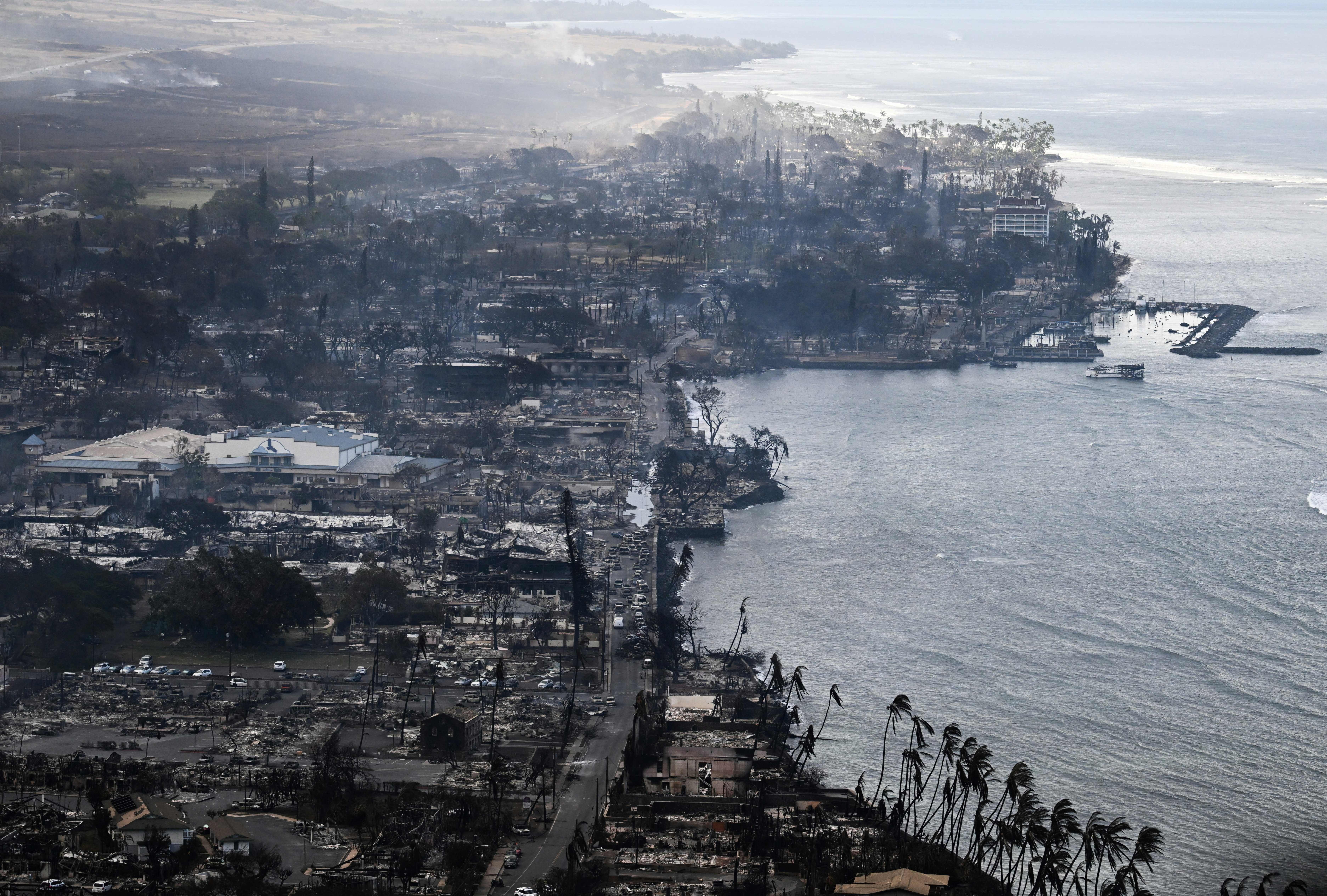 Homes and buildings were burned to the ground around the harbor and Front Street in the historic Lahaina Town in the aftermath of wildfires in western Maui in Lahaina, Hawaii, Aug. 10, 2023.