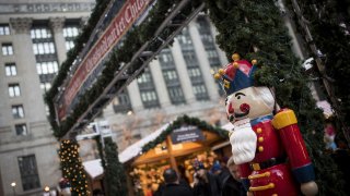 A nutcracker statue is displayed at entrance of the Christkindlmarket in downtown Chicago, Illinois, on Sunday, Nov. 26, 2017. Bloomberg is scheduled to release consumer comfort figures on November 30. Photographer: Christopher Dilts/Bloomberg via Getty Images