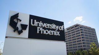 A sign marks the location of the University of Phoenix Chicago Campus in Schaumburg, Illinois.