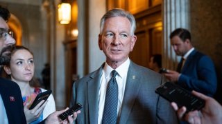 Sen. Tommy Tuberville, R-Ala.,speaks to reporters outside the Senate chamber in the Capitol on Thursday, July 13, 2023.