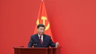Chinese President Xi Jinping speaks at the podium during the meeting between members of the standing committee of the Political Bureau of the 20th CPC Central Committee and Chinese and foreign journalists at The Great Hall of People on Oct. 23, 2022, in Beijing.